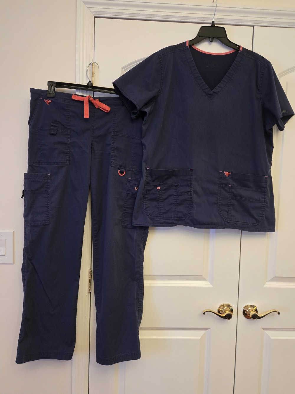 Med Couture Navy Blue Scrub Set with Coral Accents